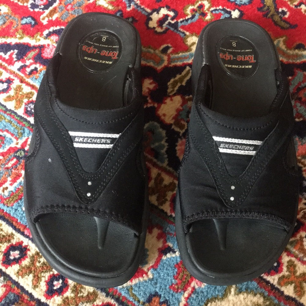 Skechers slid on Sandles..  size 8. Black